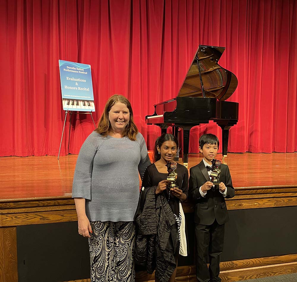 Laurel with two of her award-winning students